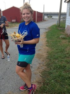 Here I am with my award — a basket of oyster-related items and an engraved knife — after the Skipjack Run 10K. (Veronica James photo)