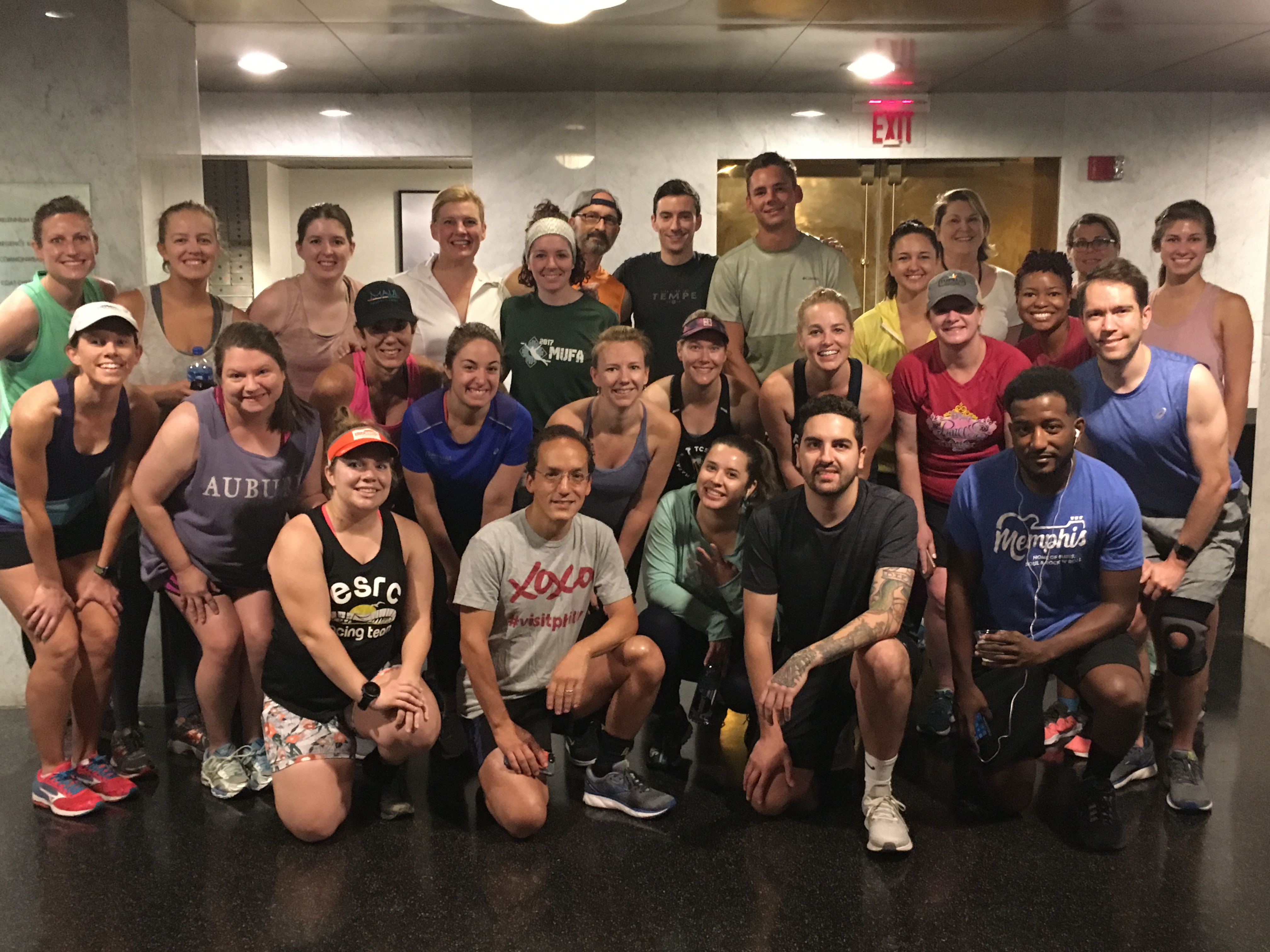 PRSA Travel & Tourism Conference participants pose for a group photo inside the Loews Philadelphia before starting the run. 