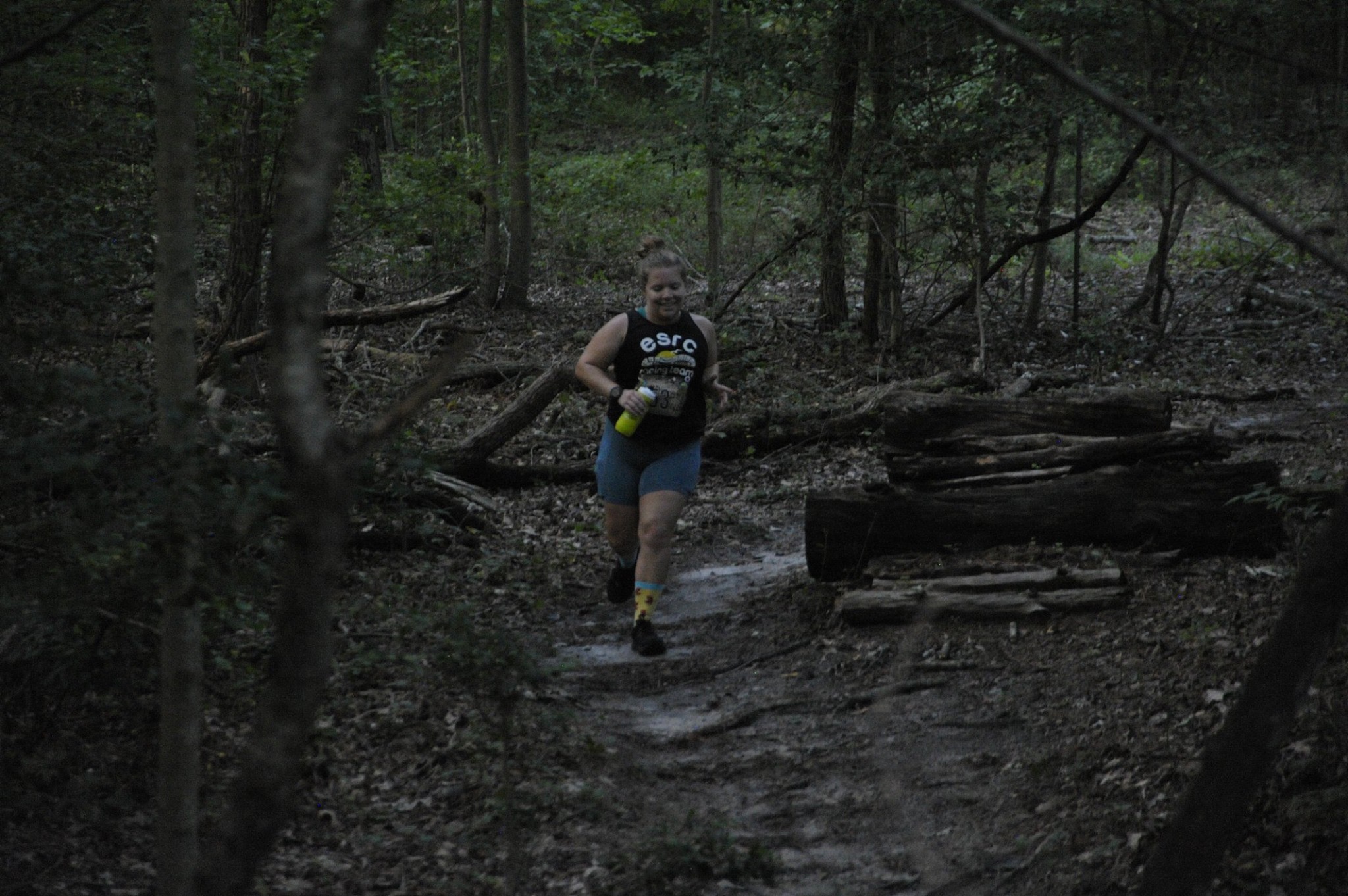 Vanessa Junkin running on a trail at the Naylor Mill 7K.