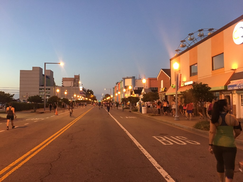 Runners heading toward the start in the early morning before the race. It's more a view of the closed road. 