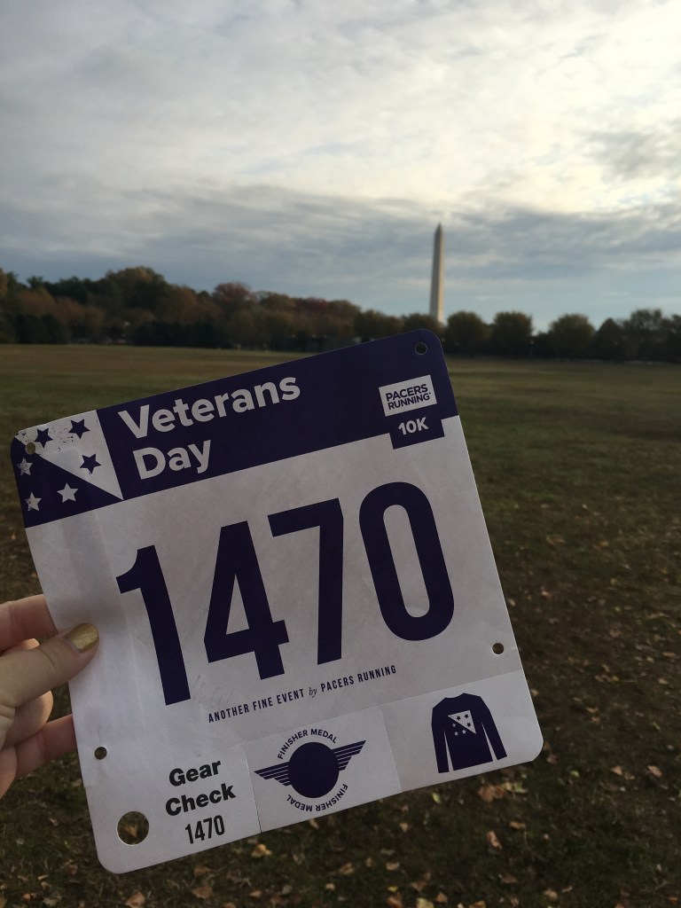 Vanessa Junkin's race bib (1470) for the Veterans Day 10K, with the Washington Monument in the background. 