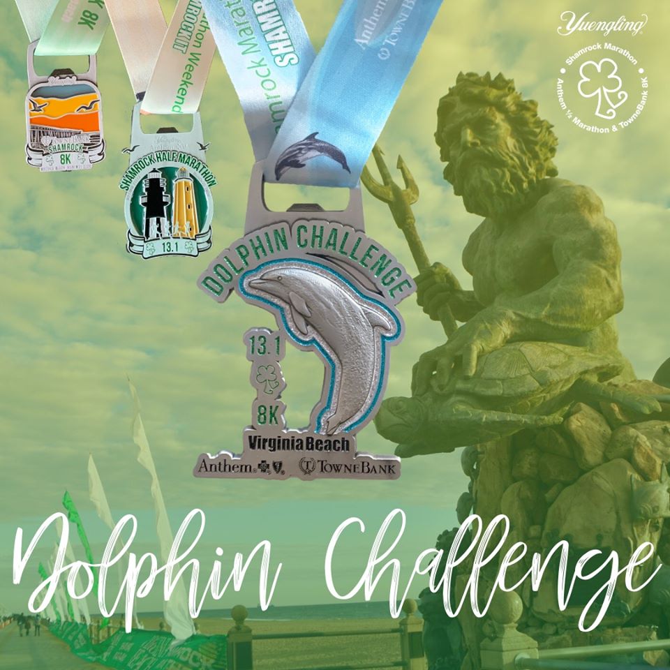 Photo from the Yuengling Shamrock Marathon Weekend Facebook page showing the Dolphin Challenge Medal, and the half marathon and 8K medal in the background, with an image of the King Neptune statue. 
