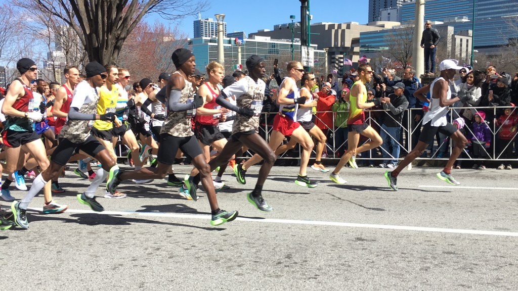 Start of men's race at Olympic Marathon Trials - group of men running. 