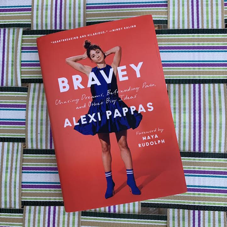 "Bravey" book by Alexi Pappas against the background of a lawn chair. 