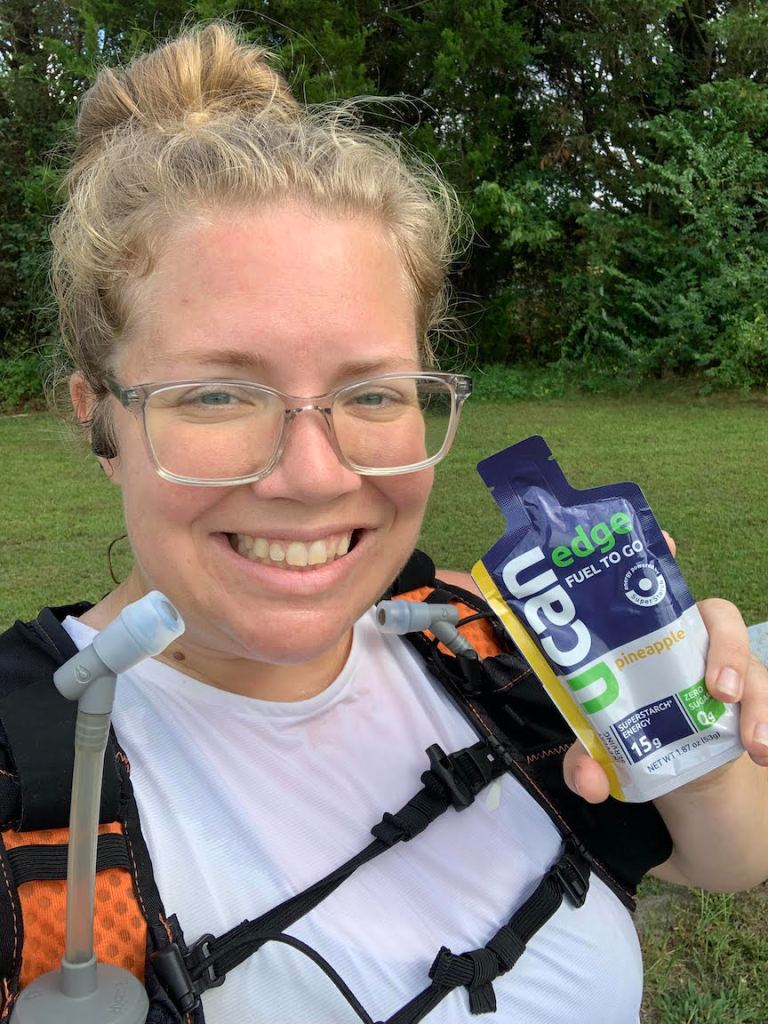 Vanessa Junkin poses holding a UCAN Pineapple Edge gel. 