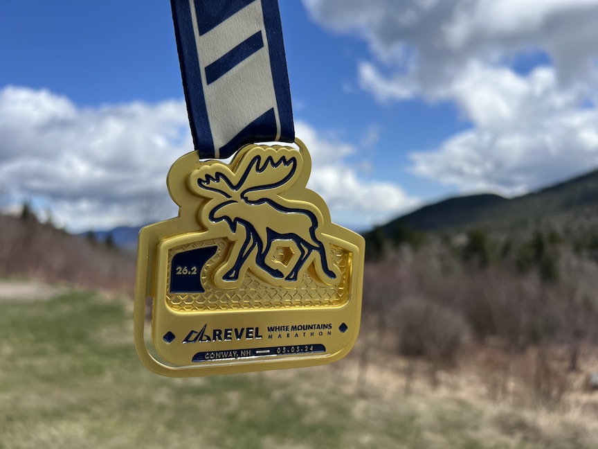 REVEL White Mountains Marathon with mountains in the distance. 