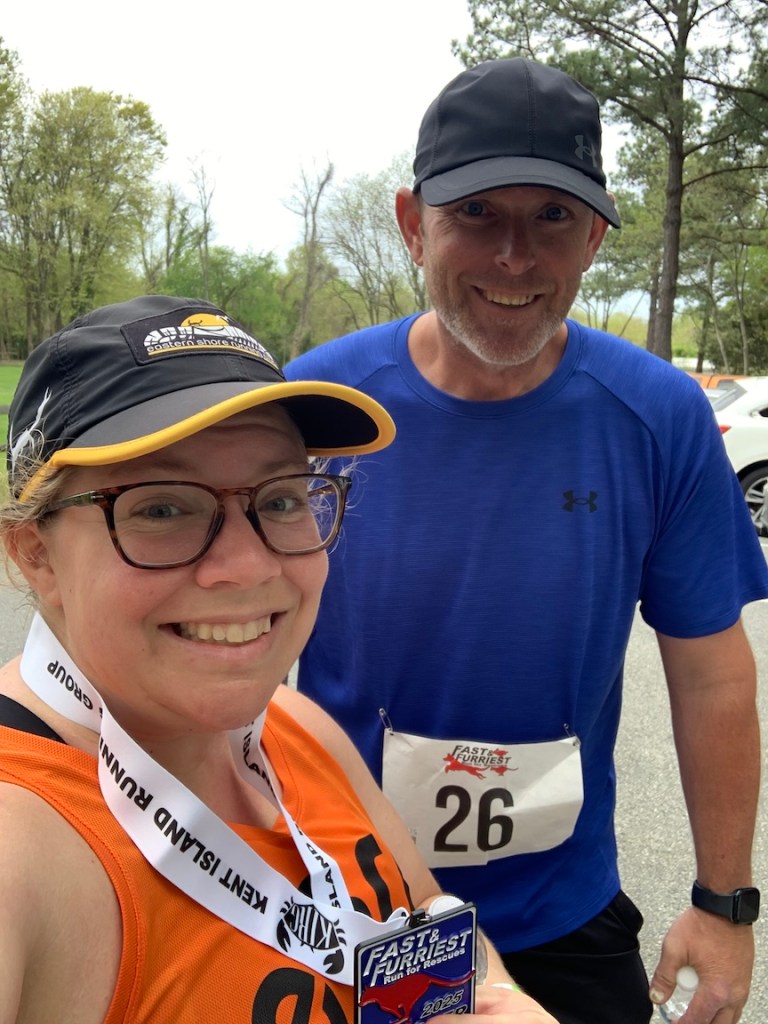 Vanessa and Chaze pose for a selfie after a race. 