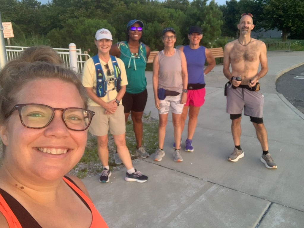 Group of six runners taken as a selfie. 